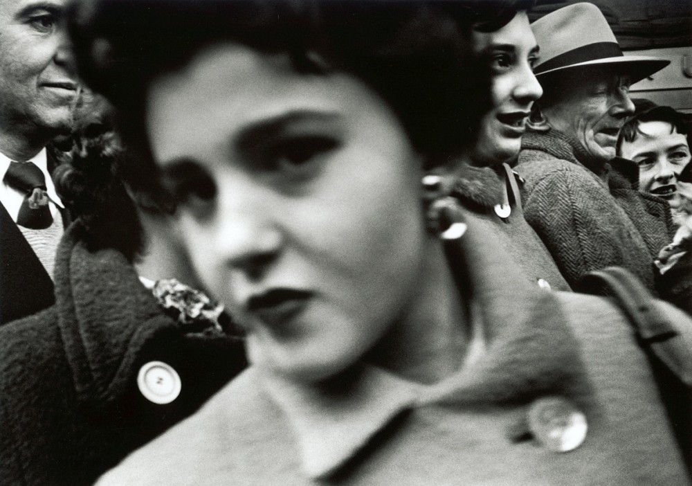 Big face in crowd, New York, 1955